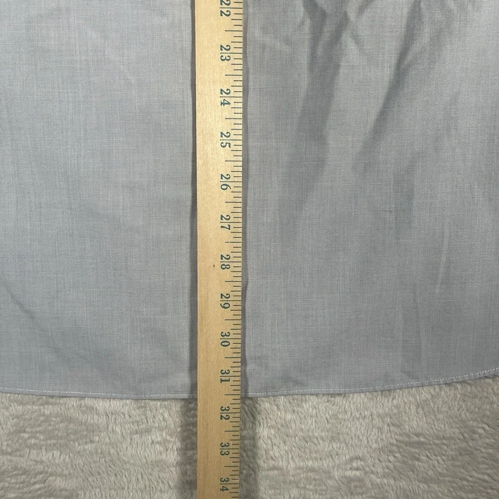 UNTUCKit small tear